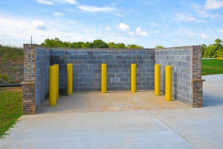 Keep Your Property Clean and Safe with Professional Dumpster Pad Cleaning Services